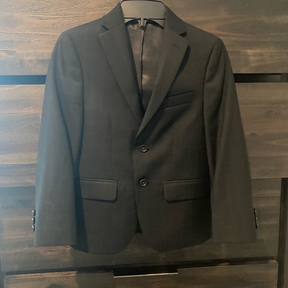 In fantastic condition. My son only wore for photos for 15 minutes.